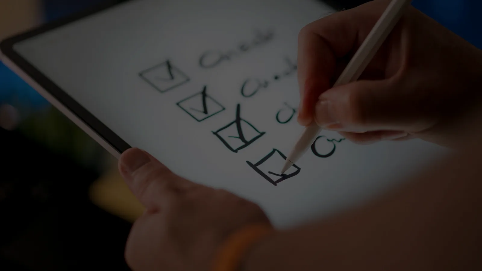 Checklist being completed on a tablet